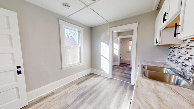 Building Photo - 7408 Dudley Ave