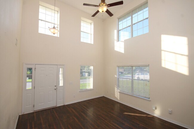 Building Photo - Spacious 4BR Home in Robin's Ridge with Soaring Ceilings, Guest Suite & Two-Car Garage