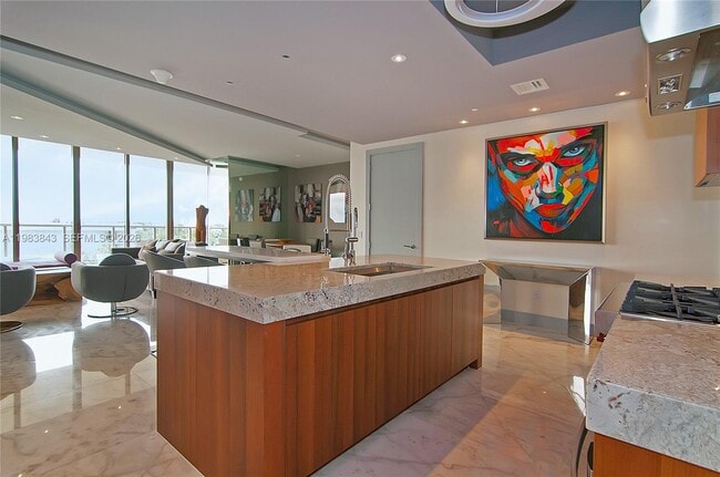 Building Photo - 9705 Collins Ave