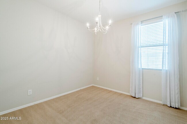 Building Photo - 9910 E Theia Dr