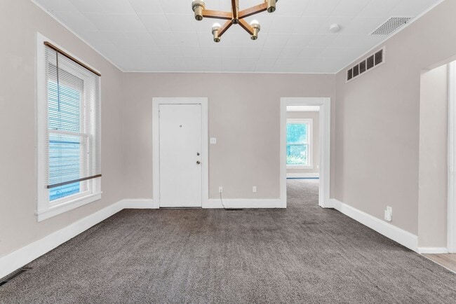 Building Photo - Charming Home with Updates and Covered Por...