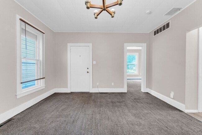 Building Photo - Charming Home with Updates and Covered Porch - A Must-See!