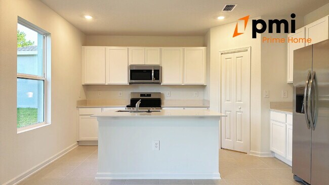 Building Photo - Brand New 5-Bedroom Home with Serene Water...