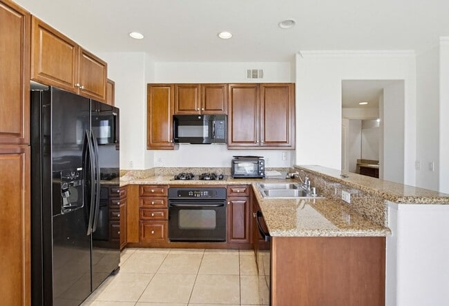 Building Photo - Single Level Condo - 2 Bedroom + Den With Views in Sabre Springs