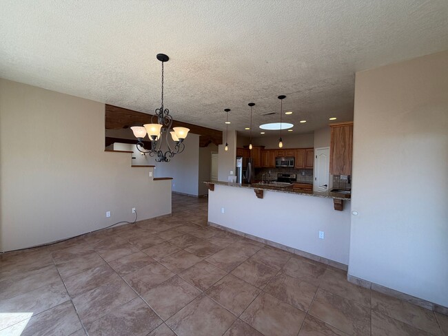 Building Photo - 4 Bedroom Single Story Custom Home Available In Rio Rancho Near Unser Blvd SE & Westside Blvd SE!