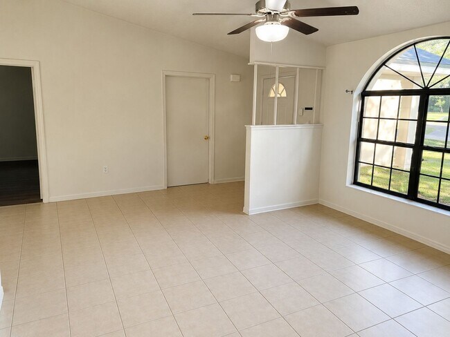 Building Photo - Beautiful 4- Bedroom Home with Arched Windows, Open Floor Plan & One-Car Garage in Silver Springs...