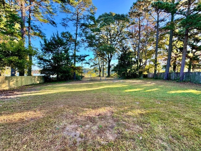 Building Photo - Available 06-22-26! Updated Waterfront Home! Extras Like Workshop & Sunroom, Pet Friendly, Hardwo...