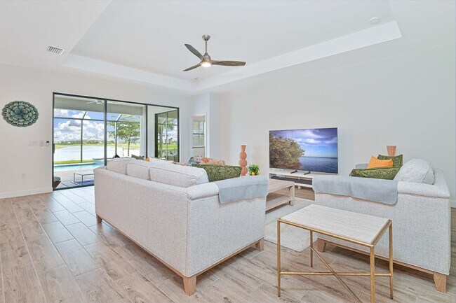 Building Photo - ** Single Family Home ~ Verdana Village ~ 3 Car Garage ~ Salt Water Pool & Lake Views **