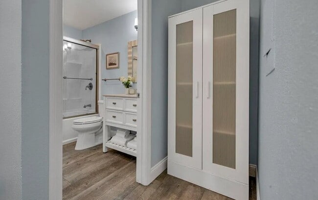 Building Photo - Turnkey ground floor condo in the coveted ...