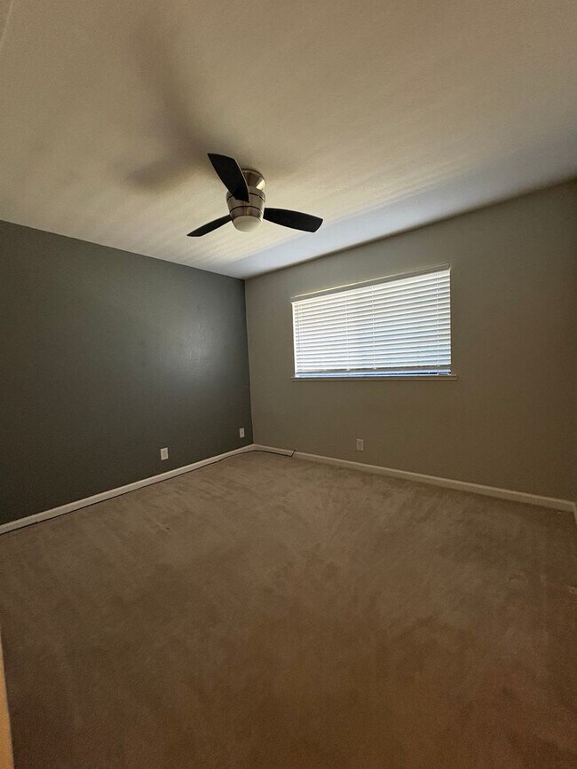 Building Photo - Your Private Escape – Charming Ranch-Style Home with Room to Breathe!