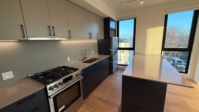 Building Photo - Epic REA - Live at Renou - Modern 2024 Building - 2 BR/2 BA