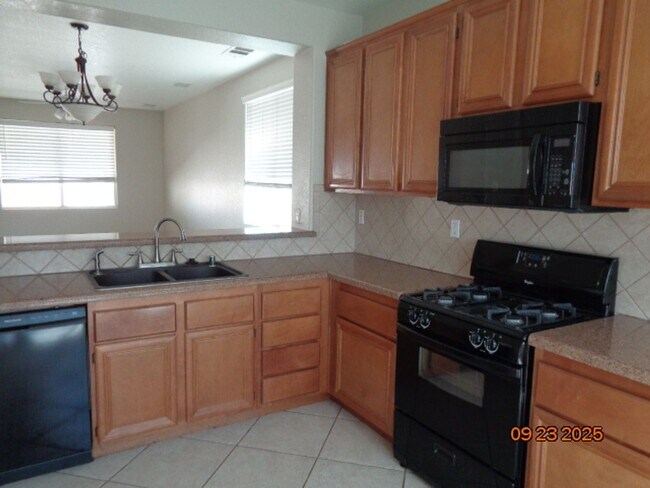 Building Photo - Beautiful One Story Offering 1559 sq. ft. ...