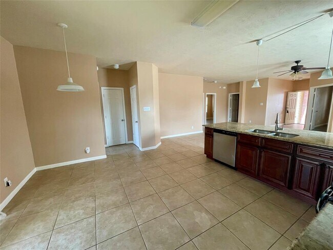 Building Photo - 10803 Woodwind Shadows Dr