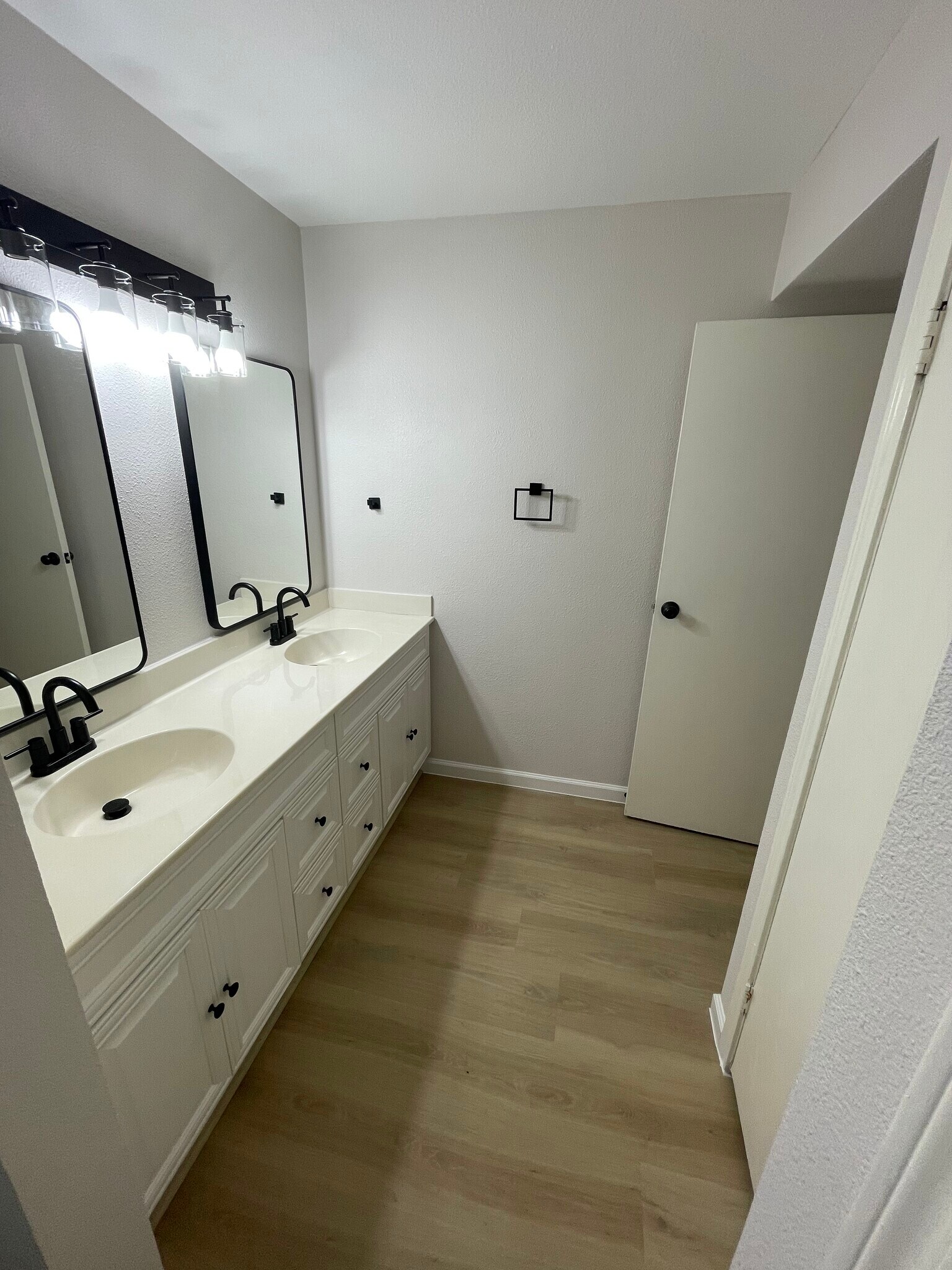 New Mirrors and Faucets - 7950 N Stadium Dr