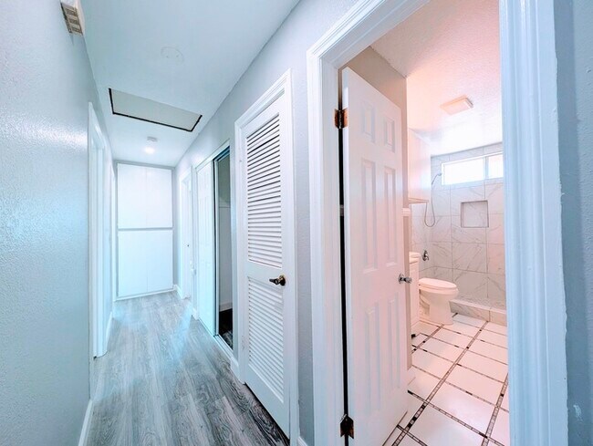 Building Photo - 4 bed with Dual master bedrooms and Solar ...