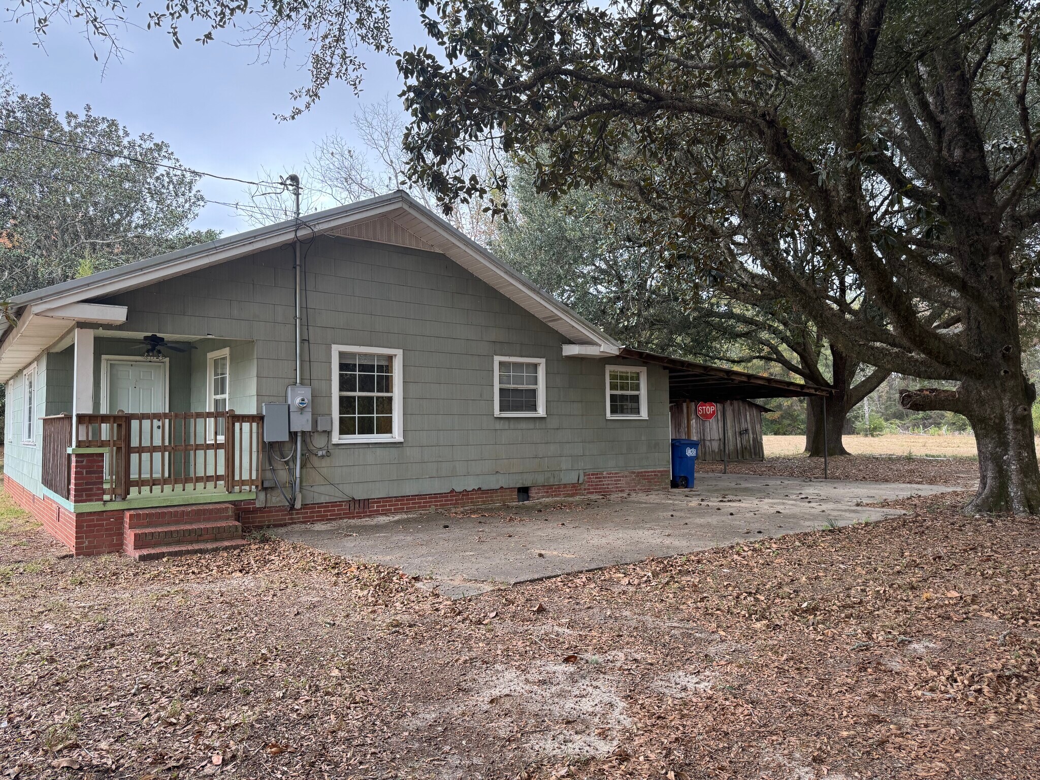 Front porch with railing and gate. - 20089 Padgett Rd