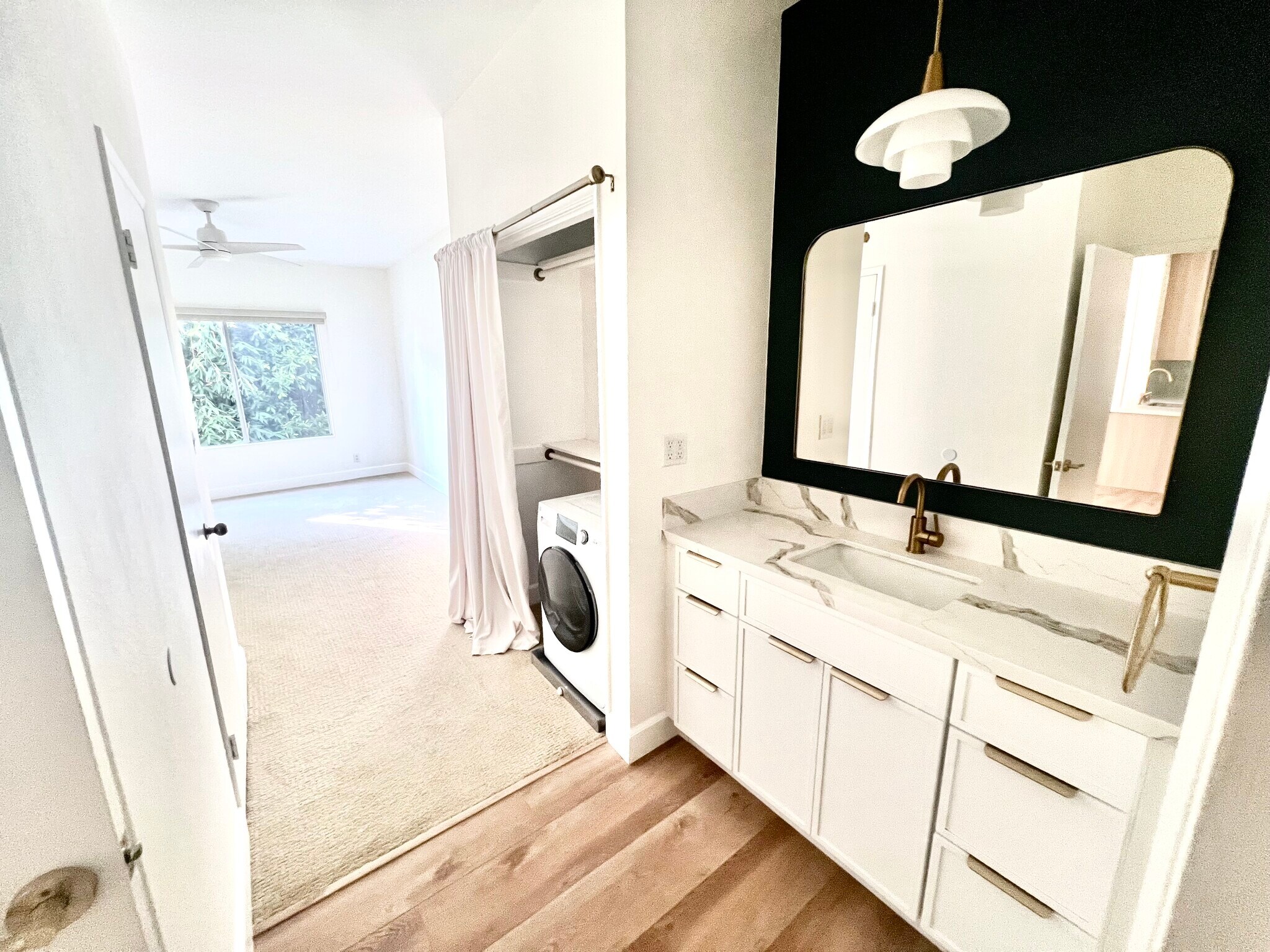 The new washer dryer sits conveniently just off the bedroom. - 2221 Ocean Ave