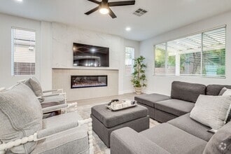 Building Photo - FULLY FURNISHED! Exudes sophistication wit...