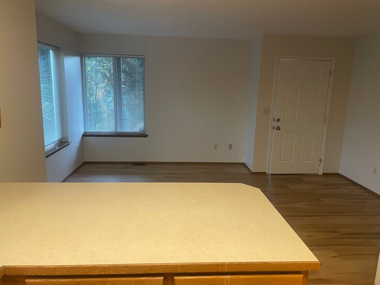 Looking at livingroom from the kitchen - 9741 Woodlawn Ave N