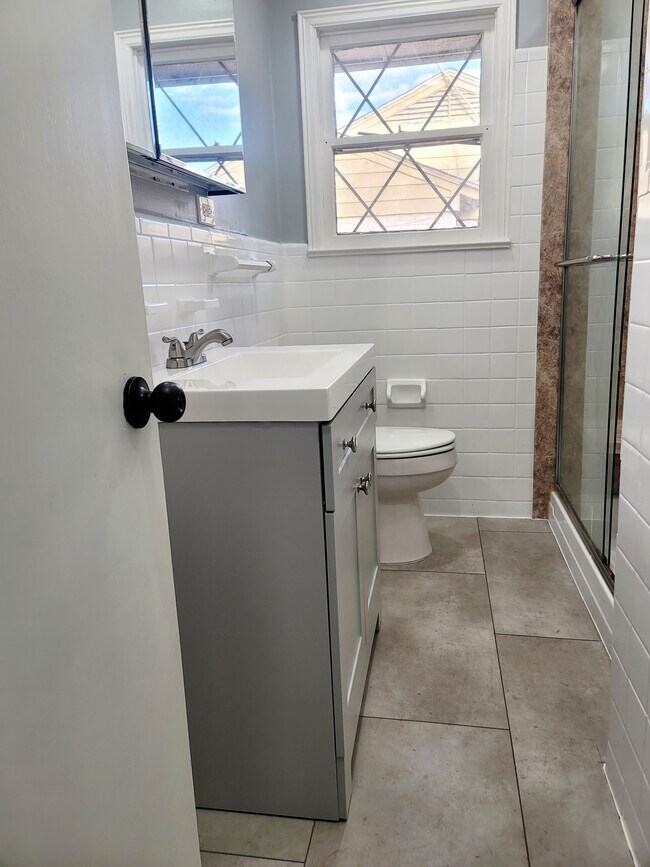 Updated Shower with Recessed Lighting Inside of Walk-in Shower - 1326 McAdams Ave