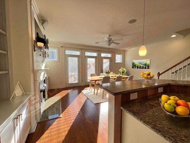 Building Photo - Elegant 3 Story 3 Bedroom Formal Model Tow...