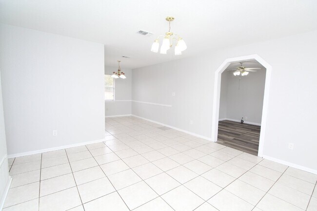 Building Photo - Charming 3-Bedroom Brick Home on Half an A...