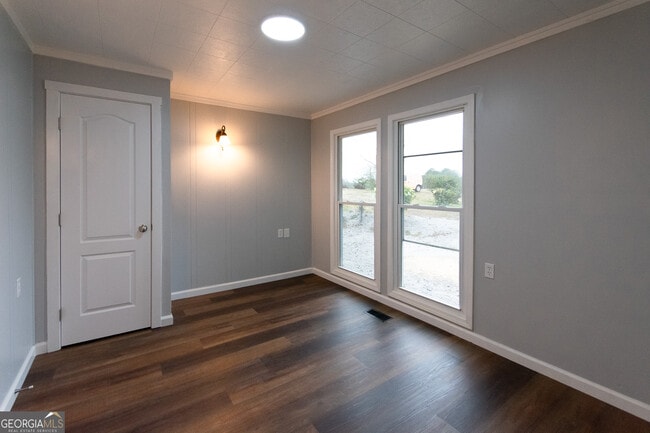 Building Photo - 7971 Roosterville Rd