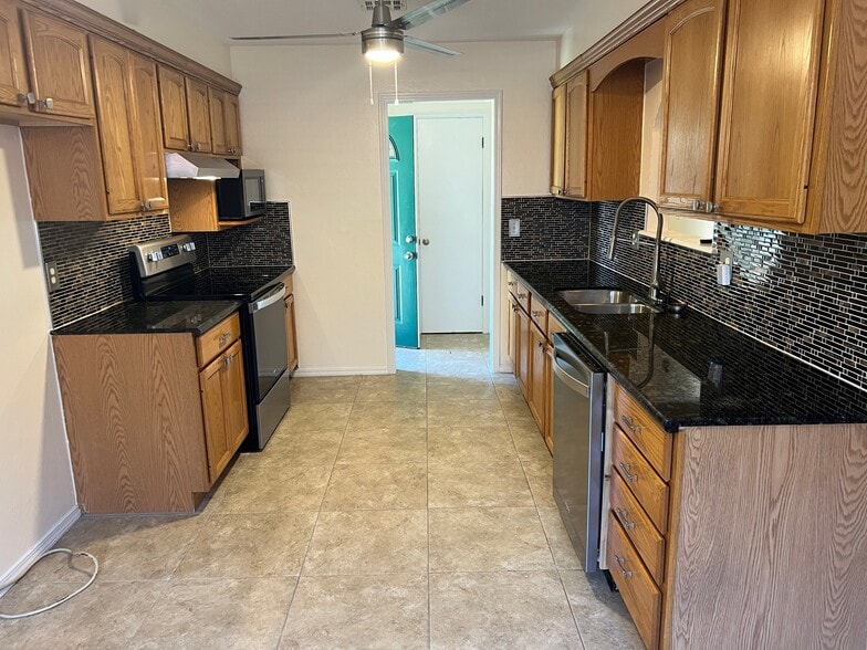 Kitchen and Front Enterance - 11013 N Brauer Ave