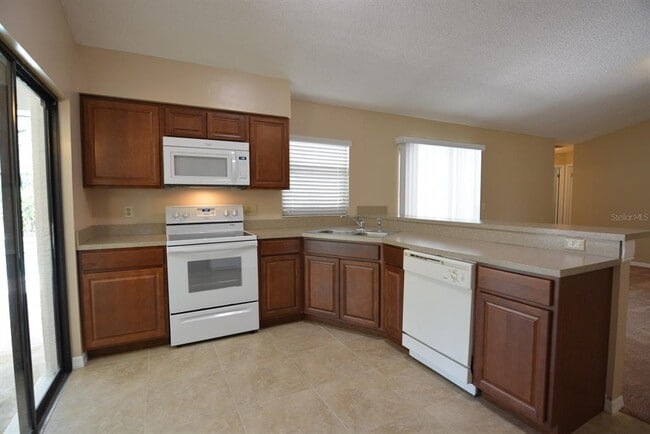 Building Photo - 5106 Sun Palm Dr