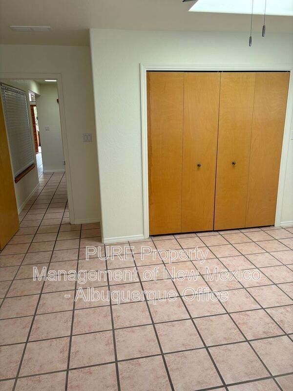 Building Photo - 8220 W Raintree Dr NE