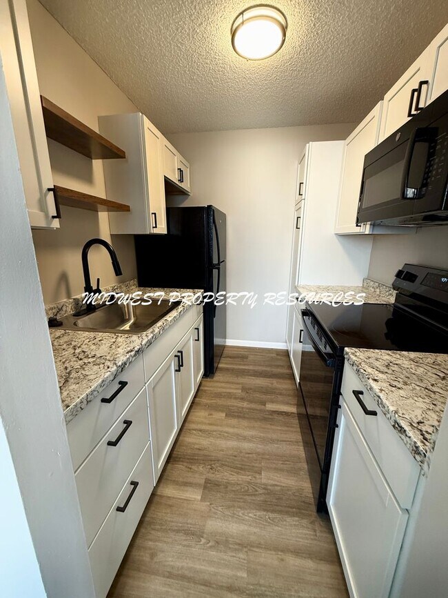 Building Photo - STUDIO Apartment Available