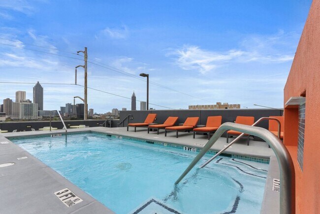 Building Photo - Awesome 1BR Loft Style Condo Overlooking Midtown!