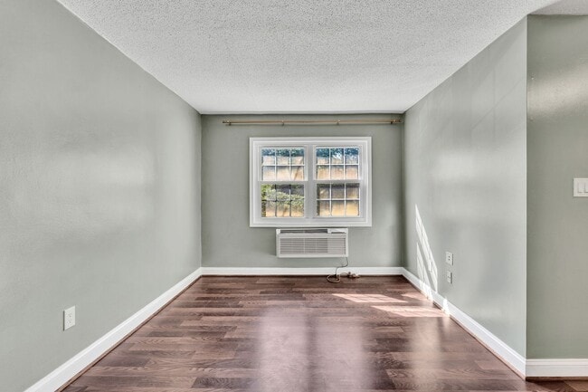 Building Photo - Utilities Included! Updated 2-Bedroom Condo Just Steps from Huntington Metro