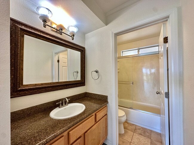 Building Photo - Updated Crown Point Condo With Wood Style ...