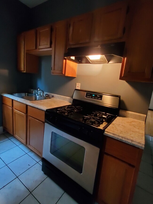 stove with hood - 3418 W Armitage Ave