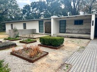 Building Photo - 2/2 with carport - fenced backyard