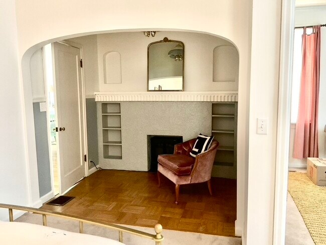 Bedroom 1 seating alcove with electric fireplace - 205 Wyoming Ave