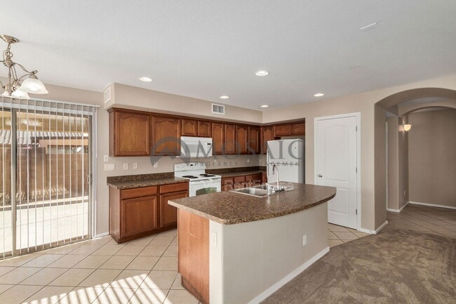 Building Photo - 5215 W Hasan Dr