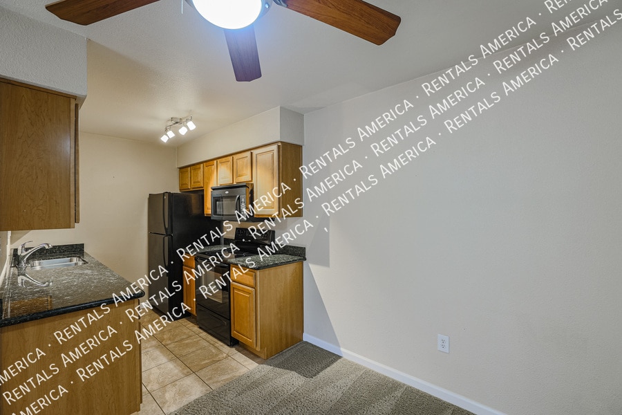 Building Photo - 5877 N Granite Reef Rd