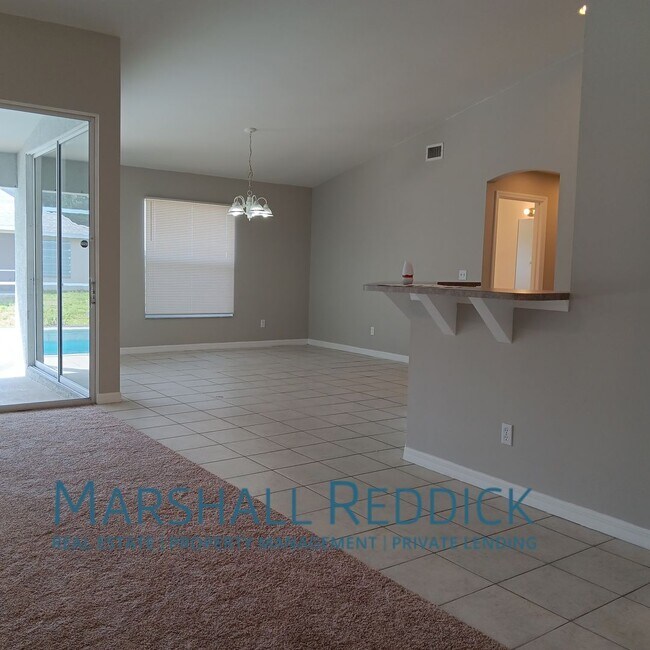 Building Photo - Pool Home 3 Bedroom,with a Den 2 Bath in d...