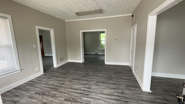 Building Photo - Remodeled 4-Bedroom, 1-Bathroom Home with Large Garage – $1,550/Month | Accepting Section 8