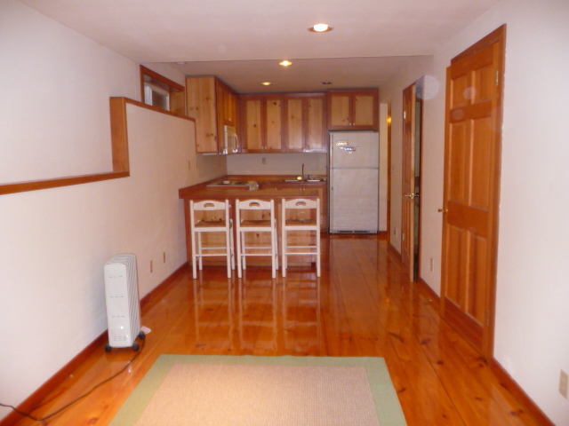 living area looking toward kitchen - 11600 Olympic View Dr NE