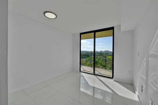 Building Photo - 1690 SW 27th Ave