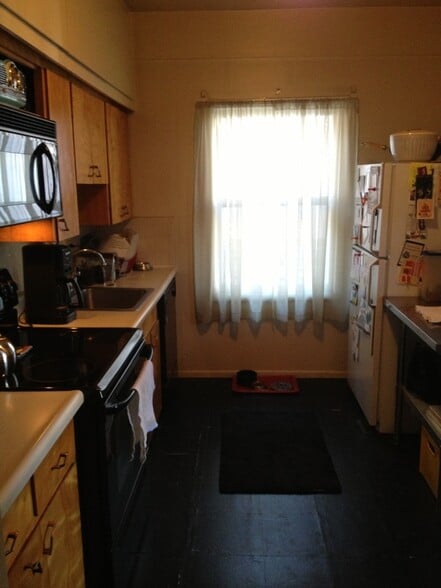 Kitchen (now w/ newer refrigerator and other upgrades than in photo) - 4361 Raleigh St