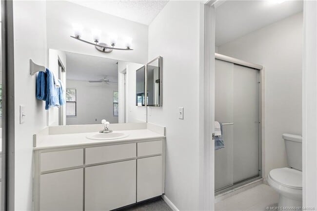 Building Photo - 7711 SE Sugar Sand Cir