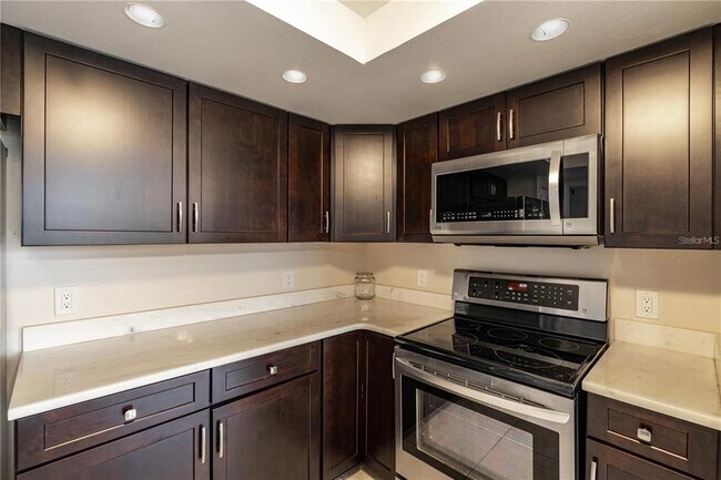 Building Photo - 5950 Pelican Bay Plaza S