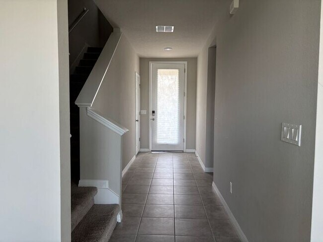 Building Photo - Like-New 4 Bedroom 3 Bath with Pond View & Two Living Spaces — Minutes to South Lake Nona