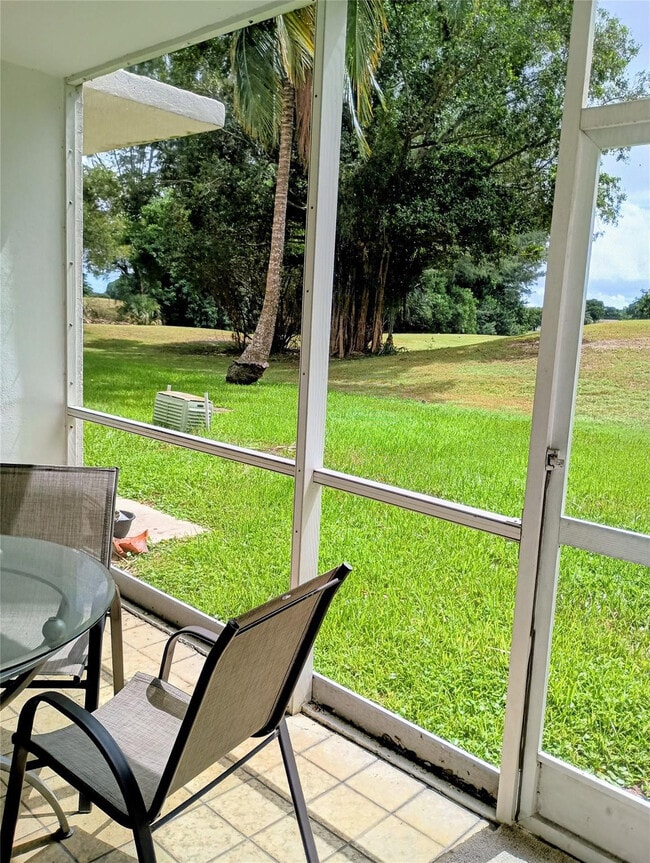 Building Photo - 3200 N Palm Aire Dr