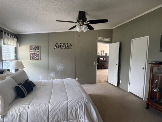 Building Photo - Spacious 3-Bedroom Home with Fenced Lot an...