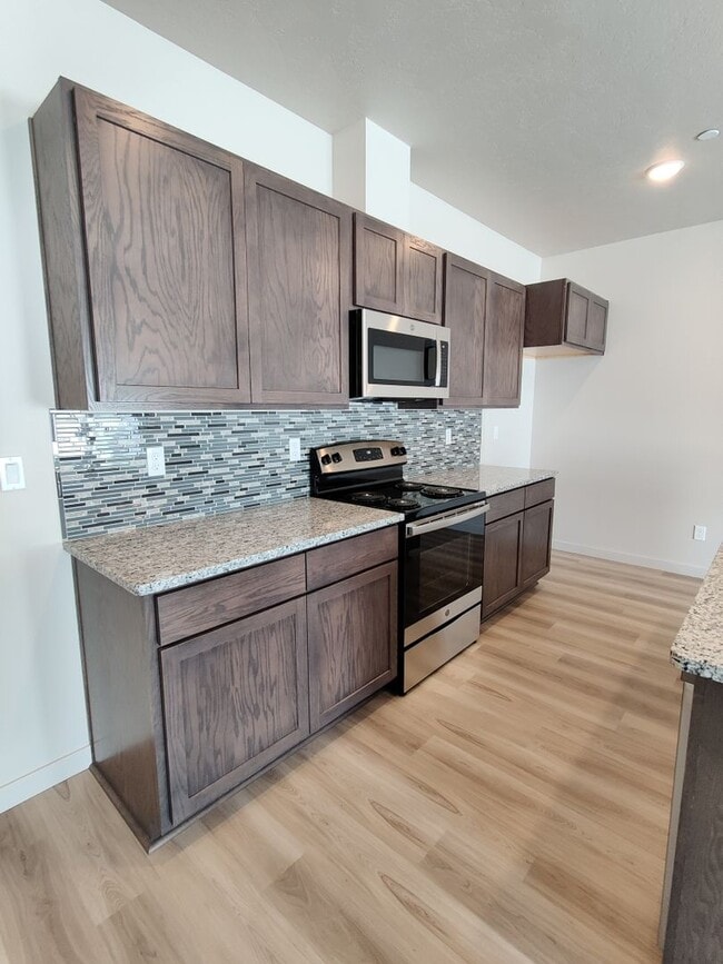 Building Photo - Updated Two-Story Home with Island Kitchen...